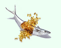 A fresh fish is cut open to reveal its main asset: Omega Fatty Acids. 