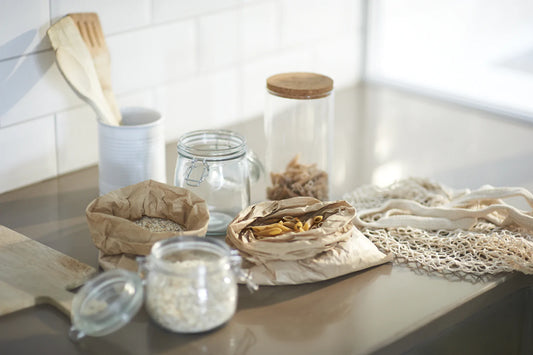 Ingredients and wooden utensils in plastic-free, zero-waste kitchen