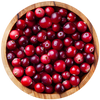 Juicy ripe red cranberries in a wooden bowl on a white background 