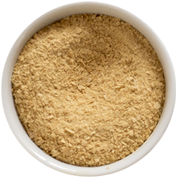 Powdered Quercetin in a white bowl on a white background